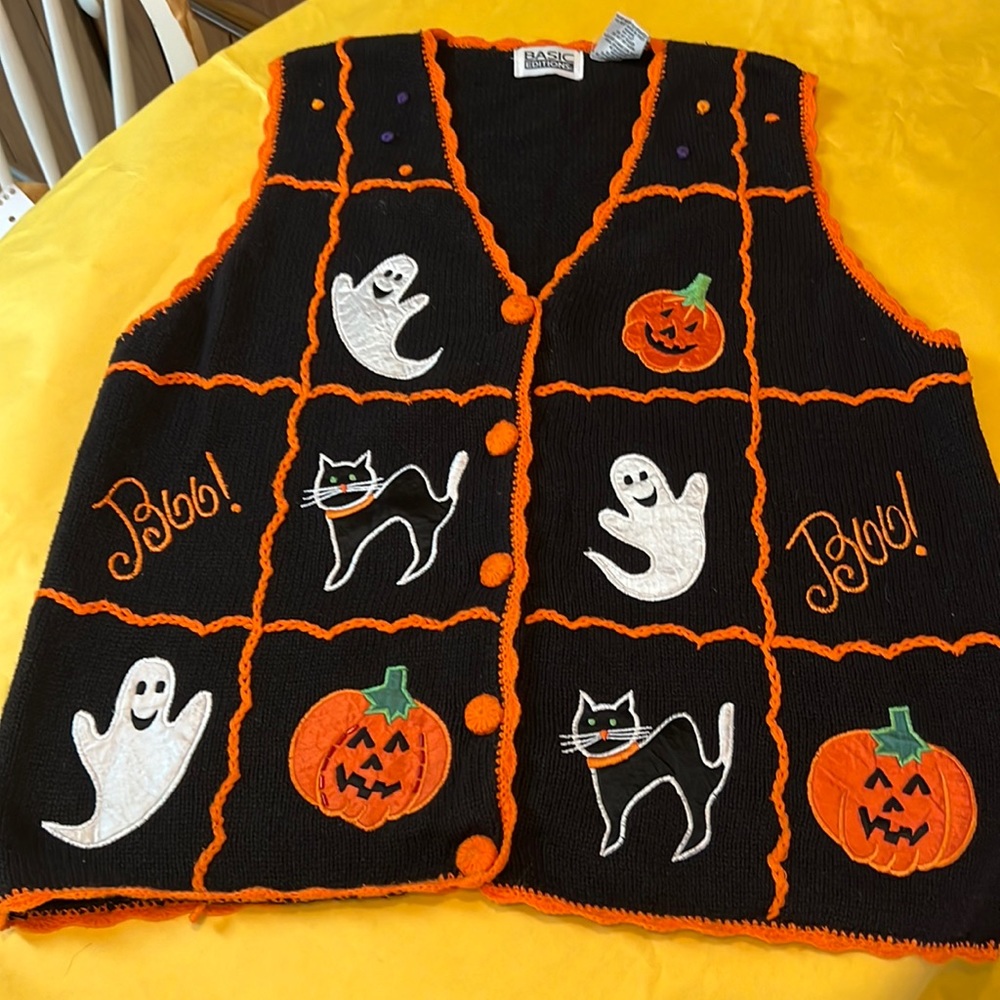 Halloween black sweater vest vey nice. Great for work and play
